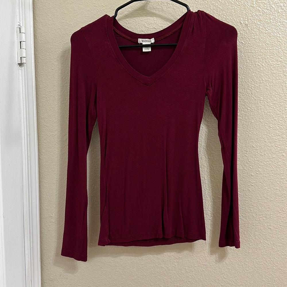 Women’s size small V-neck, maroon long sleeve shirt